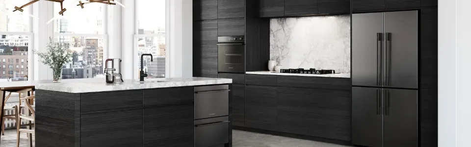 a modern chic city apartment kitchen overlooking a city with black cabinets and sleek black luxury appliances